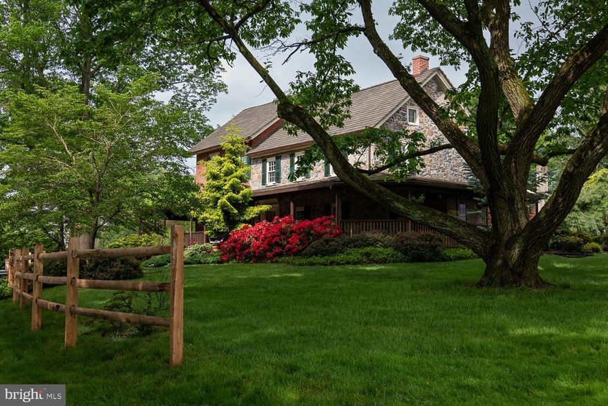 Welcome to 4217 Mill Road, also known as Les Bocages d'Chatain (The Grove of the Chestnuts)—a charming 12-acre estate nestled in the heart of Coopersburg, offering the perfect balance of history, comfort, and natural beauty. For the past 38 years, this beloved farm has been thoughtfully cared for by the same owners, and now, it’s ready to welcome a new chapter.

Steeped in history, the property was once part of the Yoder homestead and boasts a farmhouse built circa 1880, full of character and timeless appeal. Every corner of the 4635 sf home tells a story, with deep window sills, stone accents, wide plank hardwood floors, and original built-in farmhouse cabinetry. While thoughtfully updated with modern amenities, the home's rich historical charm has been preserved.

This extraordinary property features an impressive collection of outbuildings, each brimming with character and functionality. At its heart stands a magnificent three-level, circa-1800s Bank Barn, a true architectural gem showcasing timeless charm. From its hand numbered beams to its multiple horse stalls and stone façade, this barn is a stunning testament to historic craftsmanship. For the car enthusiast, the modern three-car garage is a dream come true. Not only does it provide ample space for vehicles, but it also includes a fully finished office space above, complete with electricity and heating—perfect for a private retreat or workspace.

Additional outbuildings offer even more versatility, including a spacious tractor shed with a second-floor loft, a classic smokehouse, and a functional greenhouse. Each structure adds to the property's rich history and practical appeal.

Beyond the buildings, the landscape is equally breathtaking. A serene, oversized pond invites peaceful afternoons with a picnic, while a picturesque stream meanders through the property, nurturing a thriving ecosystem of native wildlife and lush vegetation. The home’s back paver patio is a true oasis, featuring a charming gazebo, a tranquil pond, and thoughtfully designed landscaping. Adding to the property’s uniqueness is a rare grove of American Chestnut trees, a remarkable nod to the land’s natural beauty and heritage.

With its unparalleled blend of history, modern convenience, and breathtaking scenery, this one-of-a-kind property is a rare find in a fantastic location!