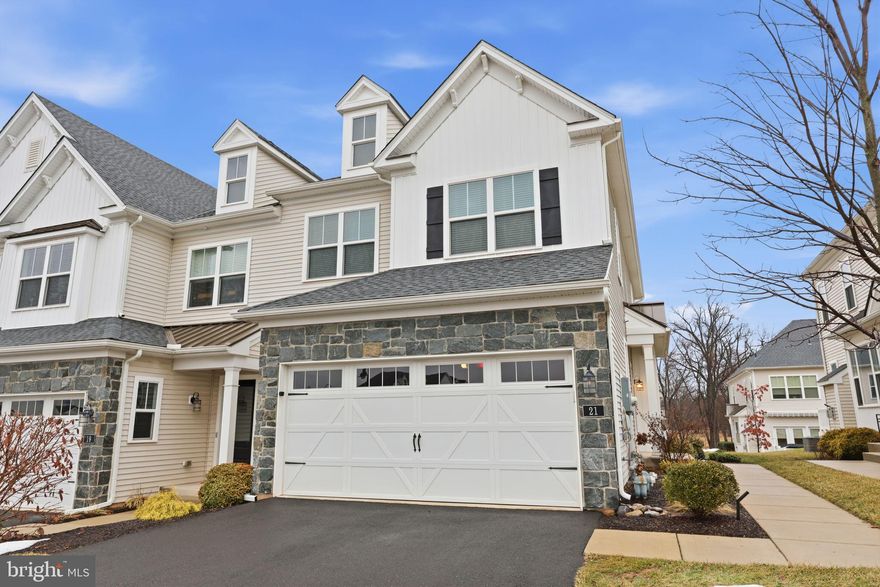 Welcome to an exceptional opportunity in the highly sought-after Reserve at Spring Mill, where luxury, lifestyle, and location come together in this beautifully maintained end-unit townhome. Homes in this desirable community are rarely available, making this a standout opportunity for today’s discerning buyer.

Designed for both comfort and elegance, this residence offers 3 spacious bedrooms, 2.5 bathrooms, and a 2-car garage. The light-filled interior showcases thoughtful upgrades throughout, including premium Hunter Douglas shutters and blinds that enhance both style and privacy.

The primary suite offers a true retreat, complete with tray ceilings, custom-designed closets, and a spa-like ensuite bath featuring a relaxing sunken tub — the perfect place to unwind at the end of the day.

The partially finished basement provides additional flexible living space and includes rough-in plumbing for a future full bath, creating exciting possibilities for a media room, home gym, or expanded entertainment area.

Adding to the home’s modern appeal, the attached 2-car garage is equipped with a dedicated 240V outlet for high-performance EV charging — a highly desirable upgrade for today’s homeowners. A state-of-the-art security system offers added peace of mind, and the refrigerator, washer, and dryer are all included for a truly seamless move-in experience.

Ideally located within the award-winning Council Rock School District and just minutes from shopping, dining, and major commuter routes, this home offers the perfect balance of upscale community living and everyday convenience.

Opportunities like this in the Reserve at Spring Mill don’t last — schedule your private showing today before it’s gone.