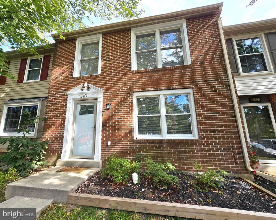 Beautiful and well-maintained townhouse! This lovely home features fresh paint, modern vinyl flooring, and recessed lighting throughout. The renovated kitchen offers stainless steel appliances in excellent condition, quartz countertops with stylish backsplash, and plenty of cabinet space. Enjoy a cozy backyard patio, perfect for relaxing or entertaining. The home also includes a new front-load dryer. Conveniently located near shopping, dining, and major commuter routes — a great place to call home!  READY TO MOVE!  Hurry up and send your offer!!