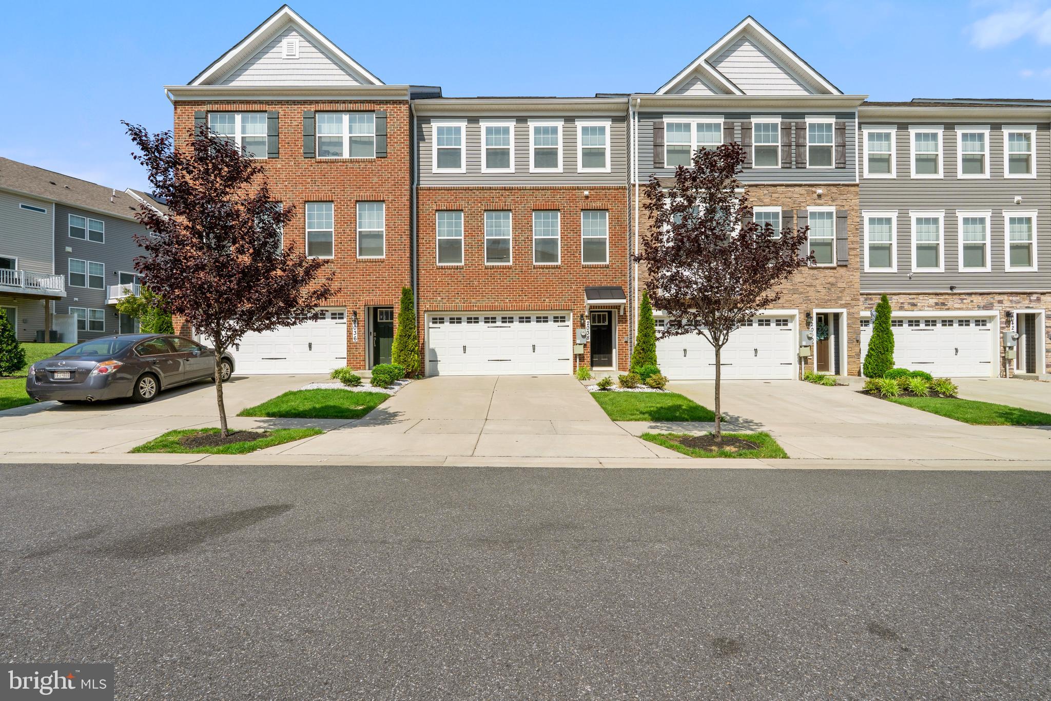OPEN HOUSE THIS WEEKEND AT 12PM-1:30PM!!!
Welcome to 2038 Ruby Turn, a beautifully upgraded 4-bedroom, 3.5-bathroom townhome located in the desirable Woodmore Overlook community. This spacious and light-filled home offers over 2,000 square feet of modern living across three finished levels, perfect for those who want style, space, and convenience just outside of DC. The open-concept main level features wide-plank hardwood flooring, oversized windows, and a seamless flow between the living, dining, and kitchen areas—ideal for entertaining or everyday life.
The gourmet kitchen is a chef’s dream with granite countertops, stainless steel appliances, a large island with bar seating, and ample cabinet space. Upstairs, you'll find a luxurious primary suite with a walk-in closet and spa-like bath including dual vanities and a glass-enclosed shower. Two additional bedrooms, a full bathroom, and a laundry room complete the upper level. The entry-level includes a fourth bedroom and full bath—perfect for guests, an in-law suite, or a home office setup.
This home also includes a rear-entry two-car garage and a spacious balcony off the main living area for outdoor enjoyment. Located just minutes from Wegmans, Costco, Nordstrom Rack, and all the shopping and dining at Woodmore Towne Centre, this home is also convenient to I-495, Route 50, and the Largo Metro Station—making your commute into DC or Northern Virginia a breeze.
Don’t miss this opportunity to live in a vibrant, newer community with walkable amenities and luxury finishes throughout. Schedule your private showing today and make 2038 Ruby Turn your next home.