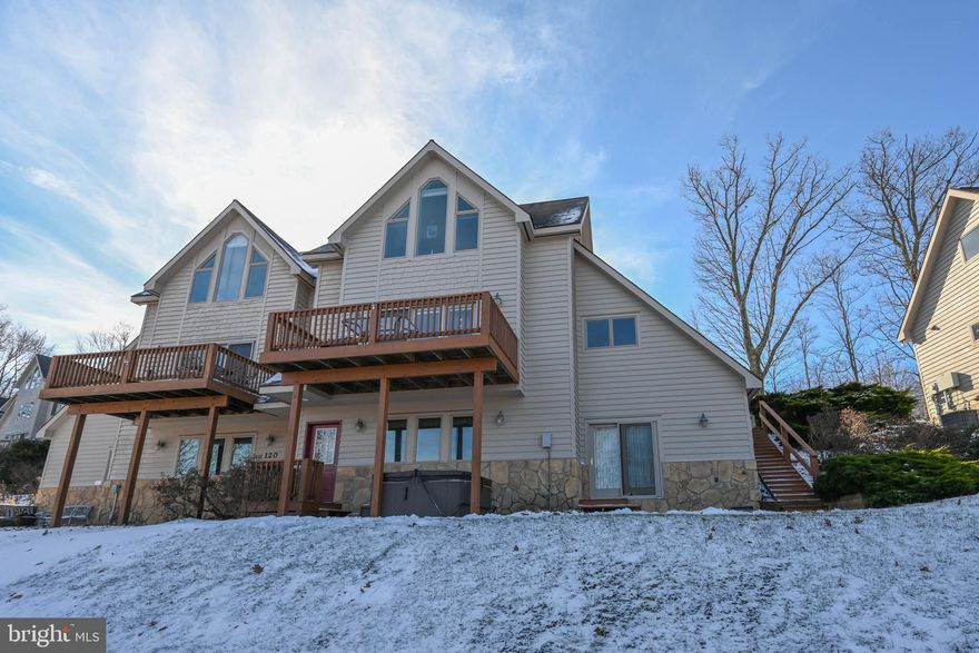 Immaculate extremely well maintained 3-Level Condominium located in the heart of Deep Creek Lake at Roman Ridge Community. 3 BR - 3 1/2 Bath Gorgeous Lake View unit , SOLD turnkey w /furnishings & accessories ready to enjoy with your family.  Lake and Mountain views from every room!  Central A/C, Propane Forced Air Heating,  Gas Fireplace with Mantle add to the comfort of this home. Leased Boat Slip opportunity available at adjoining Lakefront site.