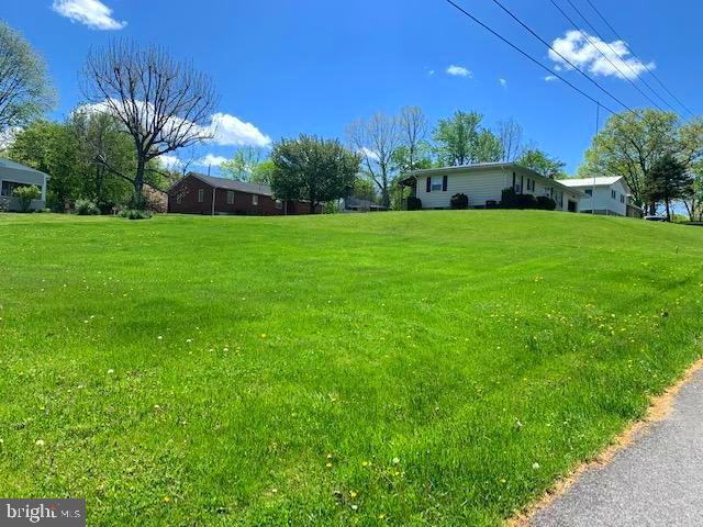 WELL- ESTABLISHED SUBDIVISION, SAVILLA-VALE, IN ROMNEY. BUILDING LOTS ARE A RARE FIND AND THIS ONE IS A GENTLY-SLOPING CORNER LOT. CITY WATER AND SEWER HOOKUPS, BUILD YOUR HOME OR KEEP AS AN INVESTMENT PROPERTY. WALK TO SCHOOLS, DOCTORS, SHOPPING, RESTAURANTS!