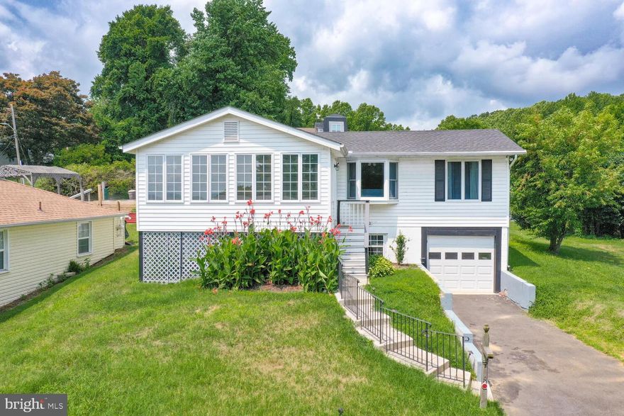 Come see this Chesapeake Beach Oasis.  This 4 bedroom 2 bath will wow you as soon as you enter.  The view of the bay is to die for.  Home was completely renovated less than 2 years ago. You won't be disappointed!