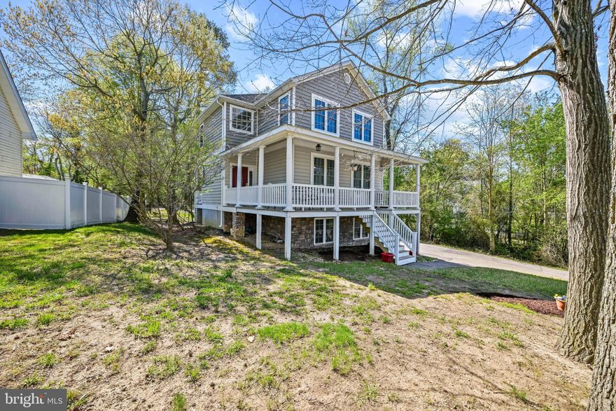 Discover a captivating blend of comfort and nature in this stunning A-Frame home, nestled along the serene banks of Cuckhold Creek. With 2,264 sq. ft. of thoughtfully designed living space, this residence features four spacious bedrooms and three and a half bathrooms, perfect for both relaxation and entertaining. The inviting interior boasts a cozy gas fireplace, ideal for chilly evenings, and a second lower level kitchen that can serve as a one bedroom rental unit or mother in law suite. Step outside to a beautifully cleared 0.26-acre lot, where you can enjoy picturesque views of the river and surrounding woods. The outdoor space is perfect for gardening, play, or simply soaking in the tranquility of nature. With ample parking for up to four vehicles, convenience is at your fingertips. Located in a vibrant community, this home offers easy access to local parks, schools, and essential public services, making it an ideal choice for those seeking a balanced lifestyle. Enjoy leisurely strolls along the river or explore nearby trails that invite outdoor enthusiasts to embrace the beauty of the area. This property is not just a home; it's a lifestyle. Experience the perfect harmony of comfort, nature, and community in this remarkable residence. Don't miss your chance to make it yours!