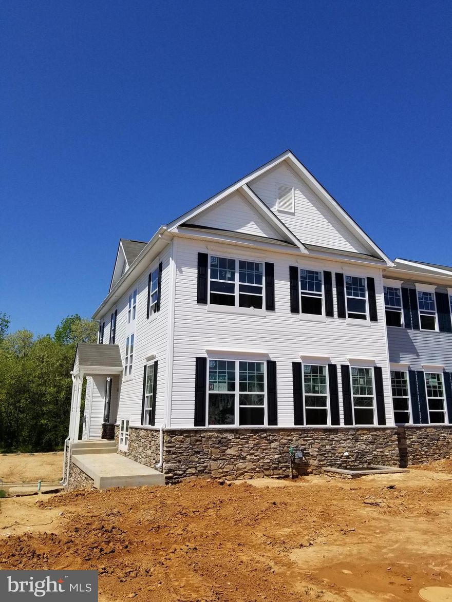 Callaway Floorplan! BACKS TO TREES! End Unit Townhome with an Estimated Mid 2020 Delivery. 2-Car Rear Load Garage, Elevator Option Available, Gas Heat, Tankless Water Heater, Gas Cooking, 4 BR's and 3.5 Baths, Granite at Kitchen, SS Appliances, Upgraded Cabinetry, Gas Fireplace, Hardwood at Powder Room, Foyer and Kitchen, Ceramic Tile at Owner's Bath, Finished Rec. Room. 2nd Floor Laundry. HUGE Owner's Suite Walk in Closet! (Exterior Selections May Vary) (This listing shows that an optional Deck can be added, but is not included in list price).