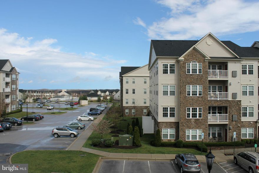 Lovely 55+ in desired Waverly Woods! Sunroom off of gourmet KIT with Corian counters w/ backsplash, maple cabinets! Living room w/gas FP and Stone Surround to balcony with lot's of warm sunshine. Owner's suite w/WIC, sitting room & spa bath w/large walk-in shower. Numerous community amenities include community clubhouse, pool, fitness center & much more