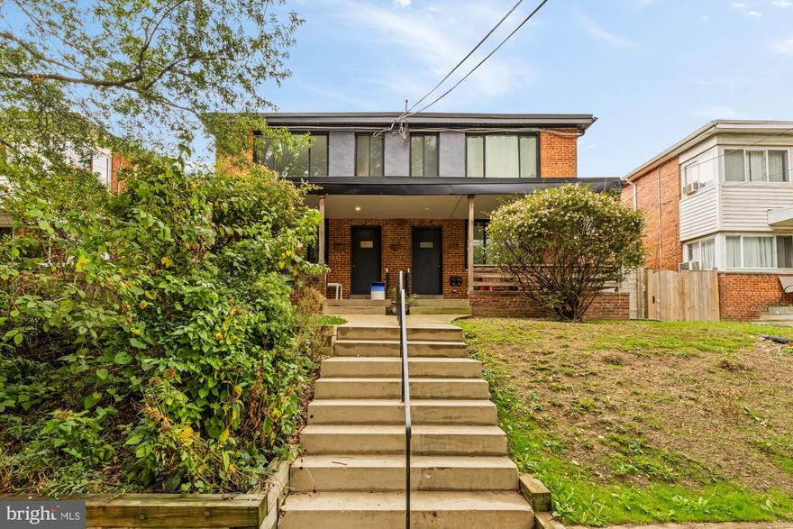 Welcome to 215 Hawaii Avenue NE, a beautifully updated semi-detached, two-unit residence. This versatile property blends classic DC charm with modern upgrades, making it an excellent opportunity for both homeowners and investors alike. Each spacious unit features hardwood floors, contemporary kitchens with stainless steel appliances, stylishly renovated bathrooms, and thoughtful layouts that offer flexibility for living, working, or entertaining.  Unit 1 (main level) features 2 bedrooms and 1 full bathroom, while Unit 2 (upper level) offers 1 bedroom and 1 full bathroom. With separate entrances and a shared fenced backyard, the building provides privacy and comfort for each residence, while also allowing room for outdoor enjoyment. The expansive backyard offers ample space for gardening, hosting, or even converting part of the lot into off-street parking, if desired. 

A unique feature of this property is its flexibility: it can remain a two-unit configuration or be converted back into a single-family home, offering multiple possibilities for future use. Located just minutes from Brookland-CUA and Fort Totten Metro stations, as well as local dining, parks, and shops, this property offers unbeatable convenience in a quiet, tree-lined neighborhood. Whether you're looking for a multi-generational living solution, rental income potential, or a smart addition to your real estate portfolio, 215 Hawaii Ave NE delivers space, style, and location in one compelling package.

Don't miss your chance to own this property, which boasts a stellar rental history, making it an ideal investment for an investor or savvy homeowner. 

- 3-phase 3-wire electrical heavy up completed in 2018.
- 30mil.TPO roof replaced in 2018.
- 2nd floor kitchen plumbing/water and gas connections have been inset into the wall,  allowing for easy flip over to an office/living space using only coverplates. 
- Rear yard has exterior French drain along entire rear,  which drains out to rock garden on the left side of the front yard. 
- All interior lighting is LED