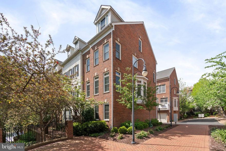 **Walk to Metro! End-Unit All-Brick Townhome in Courthouse Hill**

Welcome home to this stunning four-level, end-unit brick townhome in the sought-after Courthouse Hill community. Offering 3 spacious bedrooms, 3.5 bathrooms, a dedicated home office or potential 4th bedroom, and a two-car garage, this rarely available model boasts one of the most desirable locations in the neighborhood—directly facing Courthouse Hill’s private park with views of Rocky Run Park just across the street.

A charming brick walkway framed by cherry trees leads to the front entrance. The entry level features a versatile home office or 4th bedroom, a convenient powder room, laundry area (washer and dryer included), and interior access to the two-car garage.

The main living area is located on the second floor, where you’ll find gleaming hardwood floors, a cozy gas fireplace, and a bright living room with a beautiful bay window and plantation shutters. The large eat-in kitchen includes stainless steel appliances, gas cooking, recessed lighting, abundant cabinet and counter space, and a brand-new sliding glass door that opens to an 18-foot deck—ideal for entertaining or relaxing on warm spring and summer evenings.

Upstairs, the third level hosts the primary suite with vaulted ceilings, two walk-in closets, and a spacious bathroom featuring a heart-shaped soaking tub, dual vanities, and a separate shower. A second bedroom with a private en-suite bath is also located on this floor.

The top level offers a dramatic loft-style retreat complete with an additional bedroom, walk-in closet, full bath, and generous storage space—perfect for guests, a second home office, or a private getaway.

Freshly painted and move-in ready, this home blends style, comfort, and location.

Enjoy an unbeatable lifestyle with two nearby Metro stations (Courthouse and Clarendon), a wide array of restaurants, cafes, shops, and entertainment, including Apple, Crate & Barrel, Pottery Barn, Barnes & Noble, a movie theater, and grocery stores like Whole Foods and Trader Joe’s. With easy access to Route 50, downtown DC, Georgetown, the Pentagon, Rosslyn, Amazon HQ2, Reagan National Airport, and Old Town Alexandria are just minutes away. Outdoor enthusiasts will love the nearby Curtis Trail and Rocky Run Park, only a block away.

**Showings begin this Friday—don’t miss this exceptional opportunity!**