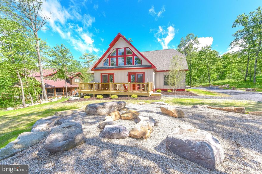 Elegant Mountain Chalet at Lodestone! Completed in 2019, this newer 6bed 5.5bath chalet features a stacked stone fireplace, vaulted ceilings, modern gourmet kitchen equipped with stainless appliances and granite tops, and an abundance of natural light throughout. With over 5000 sq ft of finished living space, 4 True Ensuites, 2 Additional bedrooms and multiple levels of gathering space, this home has plenty of room to entertain and house multiple families. Centrally located to Wisp Resort, Lodestone Golf Course, Local Marina’s, Restaurants and Deep Creek Lake – “Morning Star” is an incredible well established vacation rental grossing over $103k in 2022! Whether you’re looking for an investment, or personal mountain/lake retreat – This property has everything you need... Call today for details!