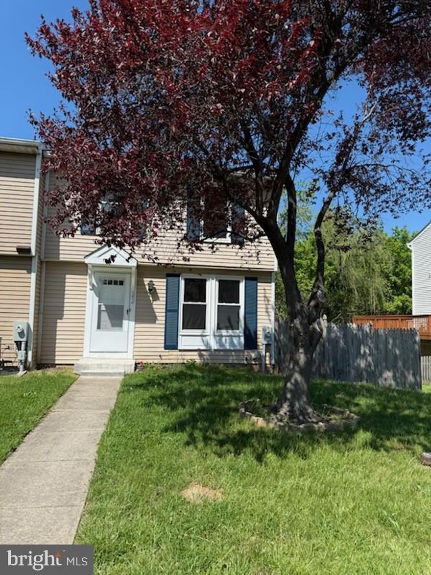 You will love this end-of-group townhouse on a dead-end court. Parking for 2 cars is allotted plus visitor parking. Beyond  your fenced-in back yard is nature at its finest, and you can use your back yard as a retreat.  3 BR, 1.5 bath with living room as you enter and an eat-in kitchen that overlooks your private deck. New stove and new microwave along with 1 new, full fridge and 1 European fridge along with good storage and a dishwasher in the kitchen. A sliding glass door allows egress to the deck.  Eight steps on the side of the deck allow access to the back yard and flat access to the basement sliding glass door.  The back yard is completely fenced-in.  Central Air and Heat along with three ceiling fans--one for each bedroom--help keep the temps comfortable for you.  The washer and dryer along with a potential hookup for a basement powder room (Buyer to verify hookup) and a good deal of storage help keep your life organized.  The large, finished open space in the basement allows for your imagination of what you would like it to be!  NO HOA. Being sold as-is, and seller will not make repairs. Come make this home yours!