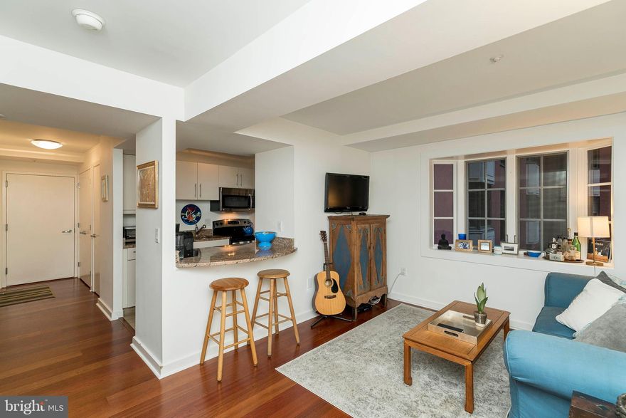 Spacious 1 bedroom with large bay window at the highly coveted Parc Rittenhouse! This spacious home offers an open concept floorplan and a large bay window overlooking the building’s landscaped courtyard. The kitchen has contemporary cabinetry, granite countertops, stainless steel appliances, and a breakfast bar. The bathroom is appointed in marble with an oversized vanity and shower/tub. The bedroom offers ample closest space. There is a stackable washer/dryer, as well as hardwood floors and generous storage space throughout. Residents of Parc Rittenhouse enjoy world class amenities and services including a 24 hour doorman; an amenities suite that includes a brand new state-of-the-art fitness center and resident lounge with pantry; media room; outdoor rooftop pool club with a large pool deck, full size pool, kids pool and hot tub; garage parking below the building for an additional fee; and two amazing restaurants on the ground floor, Stephen Starr’s Parc and Via Locusta.