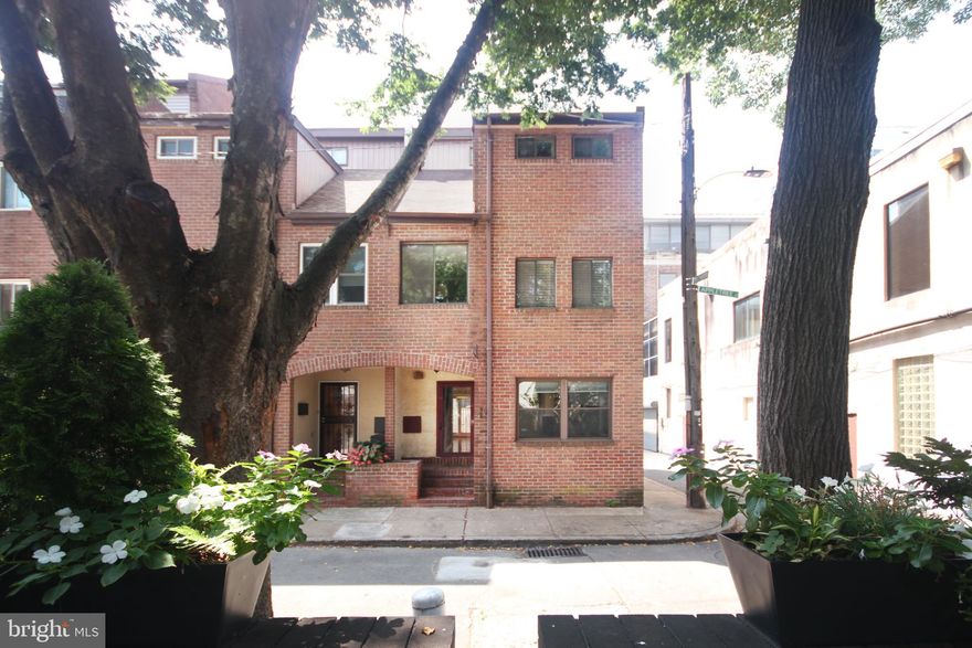 Tucked on a quiet, tree-lined side street in the heart of Center City, this beautifully maintained 3BR, 2.5BA end-unit townhome offers rare serenity without sacrificing location. Overlooking a small, lush urban park with a toddler play lot, the home feels like a private retreat—yet sits just steps from Trader Joe’s, Giant, Logan Square, Rittenhouse, and the Schuylkill River Trail.

Built on an extra-wide 18-foot lot, this 1,800+ sq ft home features a sun-drenched layout with hardwood floors, newer windows, and abundant natural light from its end-unit exposure. The double-height living area adds dramatic volume and architectural character, while the primary suite offers soaring ceilings and peaceful treetop views.

Deeded parking is conveniently located just next to the home for easy access.

Enjoy two private outdoor spaces: a tranquil backyard perfect for morning coffee or grilling, and a third-floor roof deck with sweeping skyline views—ideal for entertaining or relaxing under the stars.


Located in the coveted Albert M. Greenfield School catchment and just minutes from 30th Street Station, I-676, and the shops, cafes, and cultural institutions of Center City West. Low-maintenance, no HOA, and lovingly maintained by its long-time owner—this home delivers city living at its most livable.