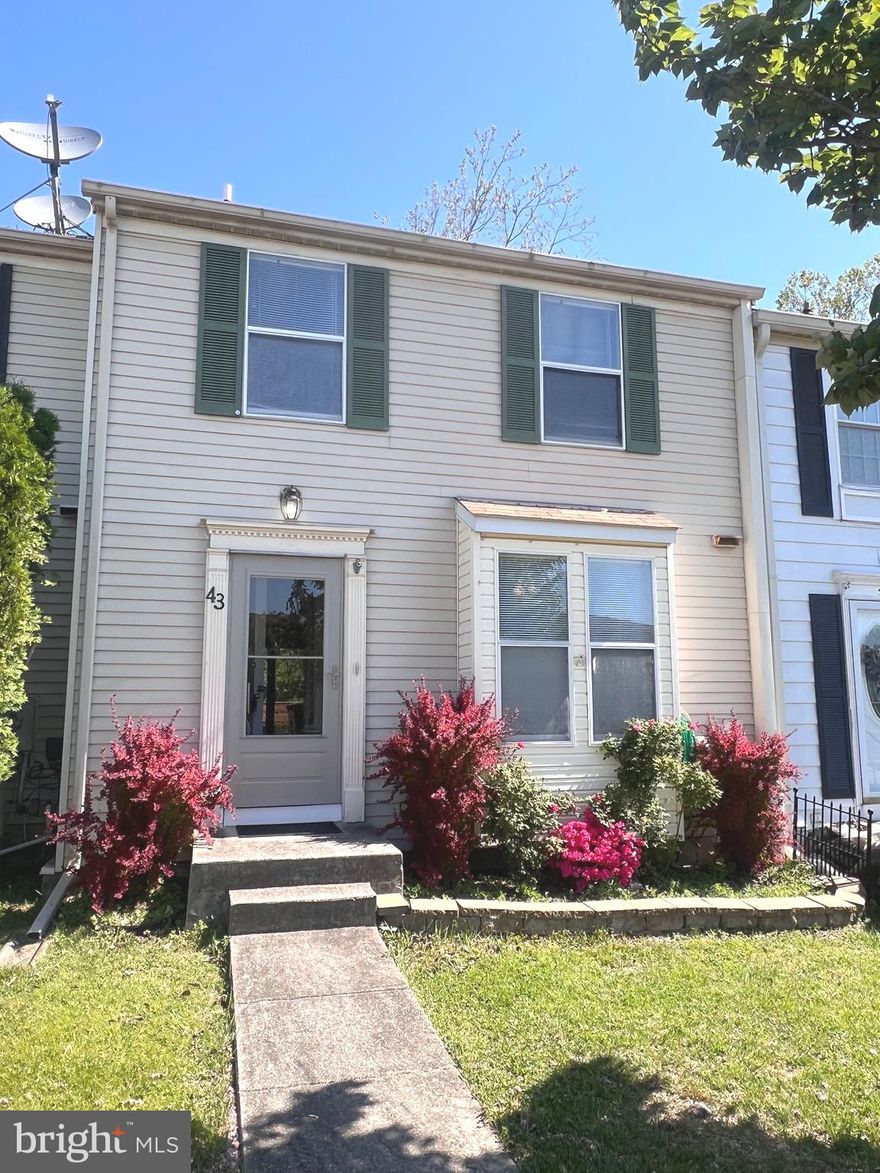 Don't miss out on this immaculate townhome! Conveniently located near everything, this 3-bedroom, 2-bath townhome features a spacious modern kitchen and a large open living room—perfect for entertaining. Your guests can spill out onto the huge deck, which offers a park-like setting, great for grilling and large enough for dancing. Upstairs, you'll find three carpeted bedrooms and a full bath. The lower level includes a second kitchen and full bath, ideal for use as an in-law suite. There's also a large club room that can easily serve as a fourth bedroom.