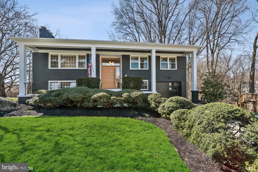 This is the home you have been looking for!
Located on a cul-de-sac in the highly sought-after Potomac Hills neighborhood in McLean. Just one stop light to DC, this house has a large, level back yard that backs to parkland.  Adjacent to Linway Terrace Park with miles of trails, you are walking distance to Highlands Tennis & Swim Club.  Excellent schools.  
This beautiful brick 5 bedroom, 3 bath home has been meticulously remodeled and completely updated over the last 18 months.  Everything about this home is top of the line and it has been designed with custom features and attention to detail. A gorgeous custom-made 8’ tall, 5’ wide pivoting Douglas fir front door opens to a soaring 2 story foyer.  A custom stainless steel/solid wood railing guides you upstairs to the completely renovated living/dining area. Natural light floods the open living space, which showcases whitewashed oak floors and contemporary light fixtures.  The spacious family room is open to the kitchen and dining area and features a ventless gas fireplace. The remodeled kitchen sparkles with top-of-the-line features. The oversized island and countertops are “Iconic White” silestone quartz.  The island seats six and features a farmhouse sink, dishwasher, a convection oven/microwave, and storage cabinets.  A subway tile backsplash extends from the counter to the ceiling. This modern kitchen features GE Café appliances throughout, gorgeous new custom cabinets, and recessed lighting.   The kitchen opens to a large deck with newly installed Wolf Serenity DeckingTM.  The deck overlooks the private back yard and beautiful parkland trees. The attention to detail continues in the fully remodeled baths, featuring glass enclosed showers and tubs, quartz countertops, new tile floors and walls, updated fixtures and lighting, and even a schoolhouse cast iron sink!A few steps down, the foyer opens to a spacious rec room with a wood burning fireplace, recessed lighting, and a new ceramic tile floor.  A built-in bookcase and cabinet feature fits a large tv, making this an ideal spot for movies or entertaining.  This level also features another remodeled full bath and 4th and 5th bedrooms.  Even the laundry room has been redone with tile and cabinetry, along with plenty of room for storage and a walk out to a water-proofed patio below the deck.
 Tankless hot water heater and much more..a must see!! Pool membership is transferable.