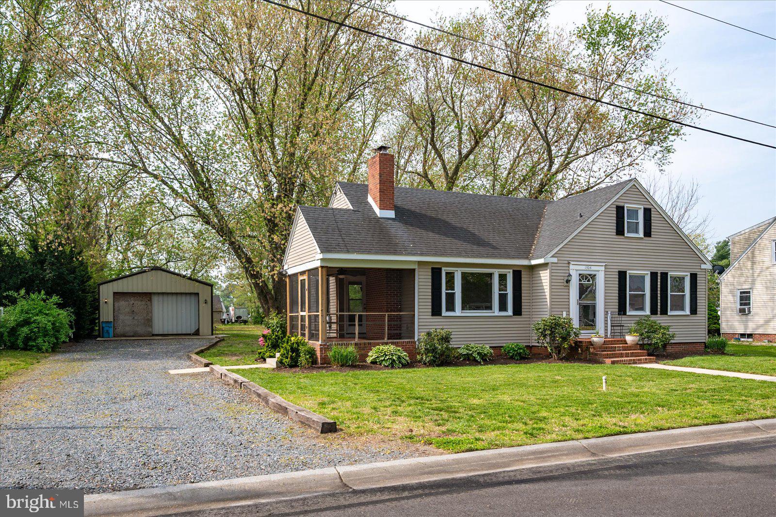 Step into timeless charm with this beautifully updated Cape Cod-style cottage that perfectly blends vintage character and modern convenience—and best of all, it’s located outside the city limits, so you can enjoy the benefits of no city taxes! From the moment you walk through the front door, you’ll feel at home in the spacious living room featuring classic arched doorways, hardwood floors, and built-in shelving that frames the cozy wood-burning stove. Thoughtful upgrades include built-in fans within the chimney that circulate warmth to the upper level. The formal dining room offers the perfect setting for gatherings, while the renovated kitchen (2020) shines with charm—complete with a deep farmhouse sink, tile backsplash, updated cabinets, counters, and modern appliances. The bathroom is equally stunning, showcasing decorative tilework and a sleek, modern tub. Upstairs, a generous finished loft area with a half bath offers flexible living space—ideal for a primary suite, office, or the potential to be converted into two bedrooms. Downstairs, a full unfinished basement provides plenty of room for storage, a workshop, or future expansion. Outside, the deep backyard is shaded by mature pecan trees—offering a peaceful retreat and space for gardening or outdoor fun. You’ll also love the 24x35 detached garage with a concrete floor, 12-foot eave height, and endless possibilities for hobbyists, car enthusiasts, or small business needs. With a newer roof (approx. 5 years old), a screened porch for morning coffee or evening relaxation, and hardwood floors throughout, this lovingly maintained home offers both character and comfort in a location that feels like country, with the convenience of the city, without the city taxes! Don’t miss this one-of-a-kind gem that combines the best of past and present.