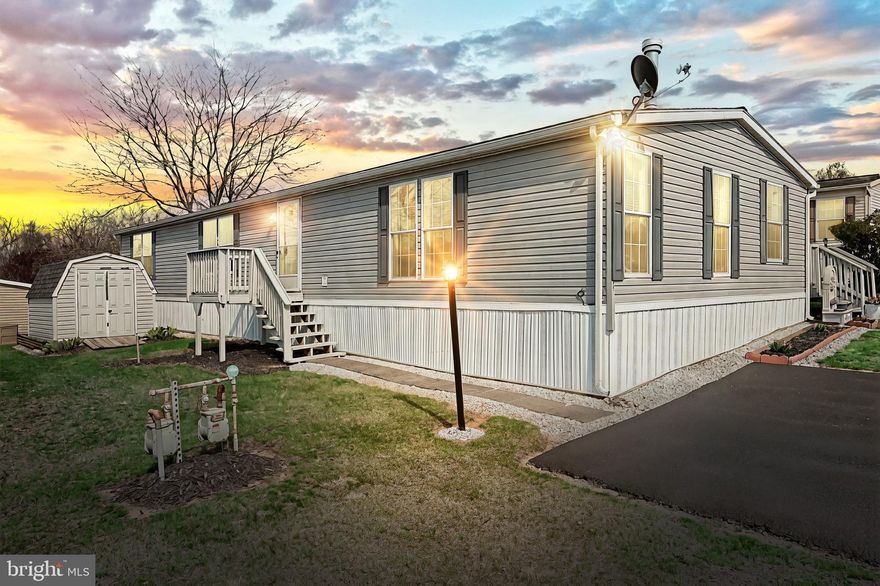 Beautifully maintained 3-bedroom, 2-bath double-wide in sought-after Eagle View Park—formerly a model home, showcasing quality finishes and thoughtful design throughout. Enjoy breathtaking mountain-top views from this spacious home featuring vaulted ceilings with crown molding, a private primary suite with en-suite bath, and both a family room and living room for flexible living. The kitchen offers a center island, gas stove, and plenty of cabinetry, with a dining area that opens to a deck—perfect for enjoying the scenery. An outdoor shed provides additional storage. Located in a well-kept community, this home is the perfect blend of comfort, style, and stunning surroundings.