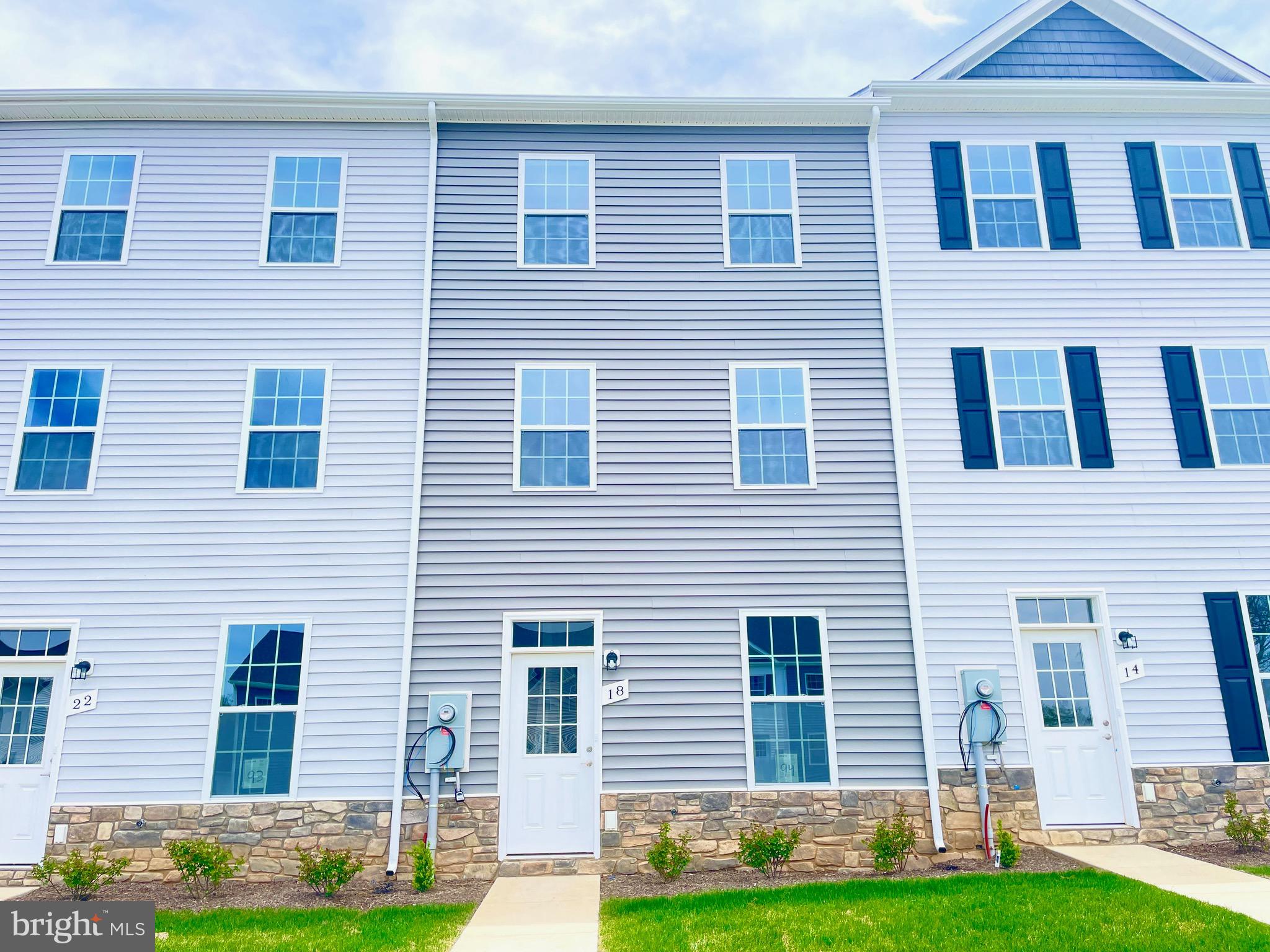 MOVE IN READY! Only 4 townhomes remain. This large 3 level home offers plenty of space with 3 bedrooms, 3 full bathrooms and 1 half bath. The entry level features high ceilings and the first bedroom, full bathroom and family room; Excellent for roommates or multigenerational living.
The main level offers a large open concept living space with laundry room, half bathroom and upgraded kitchen. All of our kitchen come with soft close cabinets, stainless steel appliances and granite counters,
Upstairs, you'll find 2 large bedrooms with private bathrooms.
Builder is offering 3% toward the buyer's closing costs.