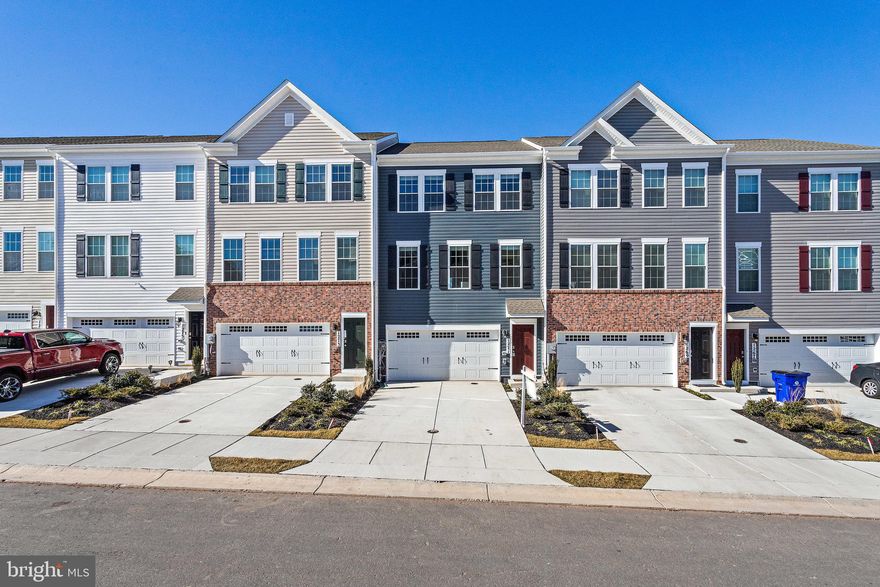 Beautiful 3 Bedroom, 3 Full Bathroom, and 1 Half Bathroom Townhome with a 2-Car Garage in the sought-after Tuscarora Creek Community. This well-maintained home features a spacious main living area with luxury vinyl plank flooring, a modern kitchen equipped with stainless steel appliances, granite countertops, and a generous pantry. Step out onto the composite deck—perfect for relaxing evenings and outdoor entertaining. The upper level offers three bedrooms and two full baths, including a spacious primary suite with a walk-in closet and an en-suite bathroom. The washer and dryer are conveniently located on the bedroom level. The lower level includes a large rec room or office space with a full bathroom and walkout access to the backyard. Nestled amid beautiful mountain views, this community is just minutes from vibrant downtown Frederick.  Move-In Ready.