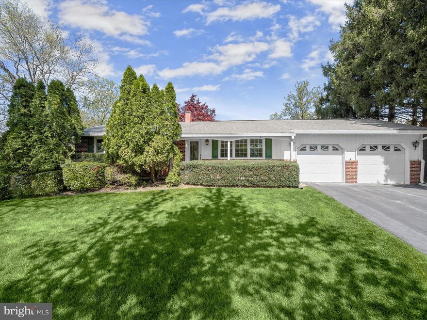 Nestled in the sought-after community of Bonnie Brae, 1614 Heather Heights offers comfortable living in a classic ranch-style layout. The main level features a bright living and dining area with hardwood floors, with the dining space opening directly to an expansive screened-in deck perfect for indoor-outdoor entertaining. The eat-in kitchen is both stylish and functional, showcasing granite countertops, decorative tile backsplash, and generous cabinet space. The primary bedroom includes a private half bath, while two additional bedrooms each with hardwood floors and a full bath along with convenient garage access rounds out the main level. The finished lower level extends the living space with a spacious recreation room offering walk-out access to the backyard, a full bath, a versatile bonus room ideal for a home office or guest room, and a dedicated laundry/storage area. Completing the home are a two-car attached garage, landscaped grounds, a covered patio, sidewalks, and streetlights, creating a welcoming and walkable neighborhood environment.   Some Photos Have Been Virtually Staged