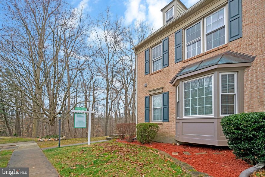 OFFER DEADLINE SUNDAY, 3/3, @ 5:00PM    End-unit Townhome with private side entrance & backing to Parkland! This lovely townhome neighborhood is a hidden gem in the heart of West Springfield surrounded by a beautiful park with walking & jogging trails. Stately Brick front townhome with tons of upgrades & a loft in the master bedroom! Gleaming brand new hardwood floors welcome you to the spacious entry and open concept, flowing floorplan. Elegant Living Rm w/ big bay window lets in tons of natural light (newer windows throughout the entire home) Spacious eat-in Kitchen w/ center Island, premium counters, lots of cabinets, efficient pantry and direct sliding glass door access to  deck for bbq'ing or relaxing while enjoying awesome views of expansive parkland! Extraordinary Master Suite with  gleaming hardwood flooring, vaulted ceilings with 2 skylights, huge walk-in closet & enter through double doors to luxurious, NEW spa-like master bath with palladium/atrium window, glass enclosed shower with gorgeous custom tile plus designer fixtures! Enormous loft area in master also with hardwood flooring with light & airy feeling throughout. 2 additional bedrooms have ample closet space, gorgeous light hardwood flooring, six panel doors and share an upgraded hall bathroom with recessed panel cabinetry, contemporary lighting & luxury vinyl plank flooring. Expansive walk-out lower level offers fantastic recreation room & office/exercise area with brand new flooring (hardwood LVP) throughout, cozy fireplace with custom tile surround & mantle,  full bath, newly remodeled finished laundry with new washer & dryer plus storage/ workshop area. Walk straight out from the lower level to the big paver patio and breathtaking views of parkland while you relax away from all the hussle & bussle of Northern Virignia! Excellent location: close to commuter lots with express bus stops to the Pentagon, short drive to Springfield Metro Station, easy commute to Fort Belvoir and so much more!