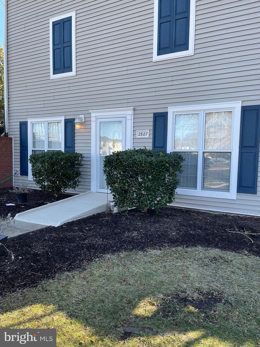 Absolute perfection....This 2-bedroom , 1bath end unit condo is fabulous.  Completely redone with new flooring, fresh, neutral paint, upgraded lighting fixtures, new HVAC AND WATER HEATER, REMODELED bath with vanity, stack washer and dryer, and linen closet,  Eat in kitchen with  backsplash, granite countertops, breakfast bar with 2 stools,  breakfast nook with ceiling fan and huge window facing lawn...freezer conveys and can be placed or stored on patio  Window treatments convey, Upgraded entry door and upgraded storm door with hidden screen.   This is a perfect beginning for home ownership and an excellent investment property as well.  Many Lake Ridge community amenities and location convenient to schools, shopping, commuter services and more.  You won't be disappointed; this home  is a Blue Ribbon Winner.  NOTE square footage. Note 1 assisned parking in front of unit + 2 stickers for visitor parking