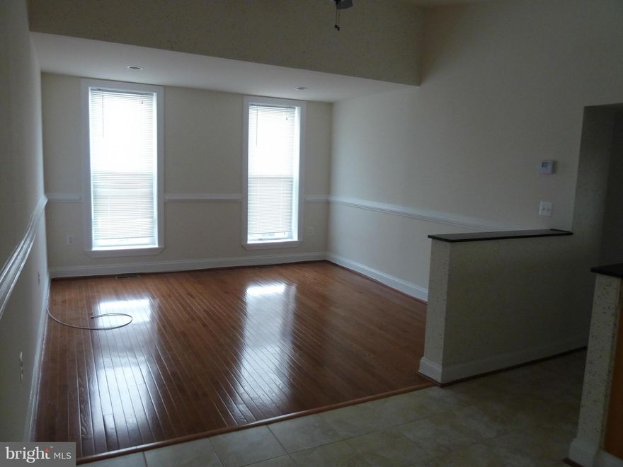 NO street parking 4 the Unit, available 7/01, nice recently renovated, suitable for roommates, wood floor, central air & heat, w/d, utilities to be included at $165 for  2, or $130 for 1. convenient location. Schedule online, occupied, 24h notice required. Go to 920 light & take Hamburg St to the alley in the rear of the building, entrance through the gate, 1st floor unit 922 C at  the door