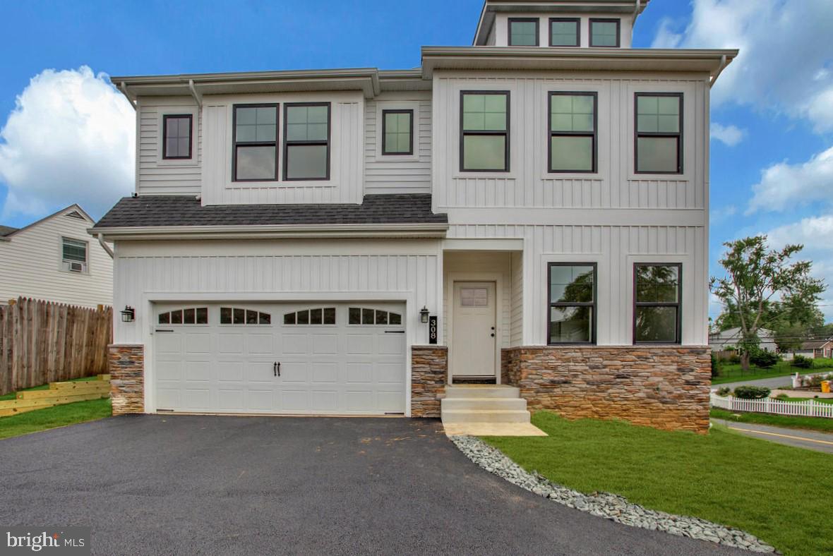 BRAND NEW CONSTRUCTION -FULLY COMPLETED AND MOVE-IN READY! Welcome to the Monroe Model by Schaefer Homes — a thoughtfully designed residence that blends modern luxury with timeless appeal. At the heart of the home, the upgraded kitchen impresses with premium cabinetry, sleek stainless-steel appliances, a beautiful backsplash, and a large island perfect for cooking, gathering, or entertaining. Champagne and black fixtures throughout the kitchen and baths add a sophisticated designer touch. An electric fireplace anchors the great room, which also features a 2" cantilever extension at the back, enhancing the space and allowing for even more flexibility in furniture layout and use.
The bathrooms are finished with upgraded tiling, adding elegance and durability, while Luxury Vinyl Plank flooring extends throughout the lower level and stairs, combining beauty with easy maintenance. Carpeted upstairs bedrooms provide a soft, quiet retreat for rest and relaxation.
An unfinished basement comes with a rough-in for a future bathroom, giving you the option to expand your living space when you're ready.
Outside, the Monroe Model offers impressive curb appeal with single-hung black windows at the front, stone detailing up to the bottom of the windows, decorative dormers, and a stylish garage door, completing its polished and modern exterior.
Discover elevated living in the Monroe Model — a home that delivers quality craftsmanship, modern upgrades, and timeless style in every detail.