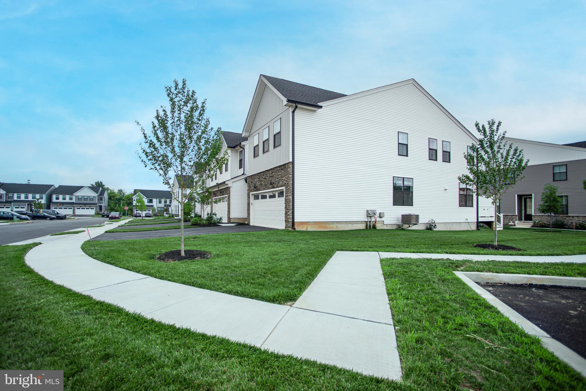 Discover the rare opportunity to own the largest model in the prestigious Stonebrook at Upper Merion community! Crafted by Toll Brothers and situated in the heart of King of Prussia, this end-unit Wyndale Elite townhome provides luxury living for those who expect nothing but the best!
Step into the soaring two-story foyer and be welcomed into a sun-drenched great room and bright dining area, with access to an expansive deck—perfect for entertaining or relaxing outdoors. The gourmet kitchen features a large center island with breakfast bar, wraparound counters, premium appliances and upgraded cabinetry. A powder room, office/den, and direct access to the two-car garage complete the main level.
Upstairs the primary suite offers a large walk-in closet and dual sinks, walk-in shower, and linen storage. Two additional bedrooms, each with their own walk-in closet, share a double vanity bathroom. A spacious laundry room is also conveniently located on this level. Need more room? The unfinished basement offers abundant storage and the potential to create a custom space for future needs.
Nearly every detail has been upgraded—from flooring, cabinetry, and appliances to deck, stairs, plumbing, and electrical. All in a sought-after community with easy access to shopping, dining, major highways, parks, walking trails, and world-class healthcare. Move right in and start enjoying the home you’ve been hoping for!