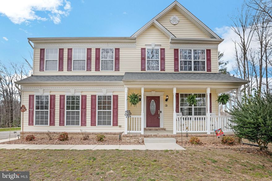 Your dream home search stops here with this beauty.  Drive into this alluring subdivision that shows off its beautiful spacious lots.  This 4 bedroom, 3 1/2 bath colonial is stunning.  Enjoy refreshments on the front porch with the delightful view, or in the tranquil setting on the back deck with bar seating or even step down to the large patio.  This all sets the scene to this wonderfully large level 2-acre lot including a firepit for more outdoor enjoyment.   When you step inside, the foyer invites you to a light and cozy sitting area where you see right out into your front yard with the lovely budding trees.  There is a half bath set right off the sitting area.  The sizable kitchen comes equipped with a dishwasher, refrigerator with icemaker and water, built-in microwave and garbage disposal.  The storage is a breeze with the pantry and cabinet space.  The open kitchen design allows for possible eat-in area that flows right into the  family room.   Walk up the stairs to come to the spacious master bedroom which has an ensuite with double vanities, spa tub and separate shower as well as a walk-in closet.   The new luscious W/W Carpet upstairs is a wonderful addition.  The open flow upstairs invites you into each bedroom.  Fall for the convenience of another full bathroom upstairs.   Step down to the finished basement with wet bar and full bathroom to enjoy entertaining.     The sizable 2 car attached garage has a workbench for any enthusiast.