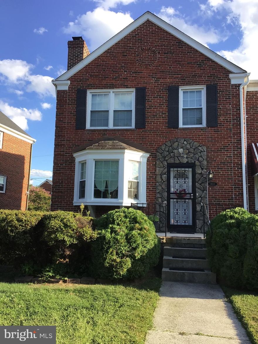 Move right into this beautifully updated all-brick, 3-bedroom, 2-bath end-of-group home. This property combines classic durability with modern conveniences, offering extra privacy as an end unit. Solid wood floors run throughout the house. Stunning windows, including bay windows in the living and dining rooms, create an open, airy feel with plenty of natural light.
The kitchen features granite countertops and an island that provides extra storage and space for stools, keeping your cooking area organized and functional.  All kitchen appliances convey.  The finished lower level includes a full bath. This home is a must-see!
