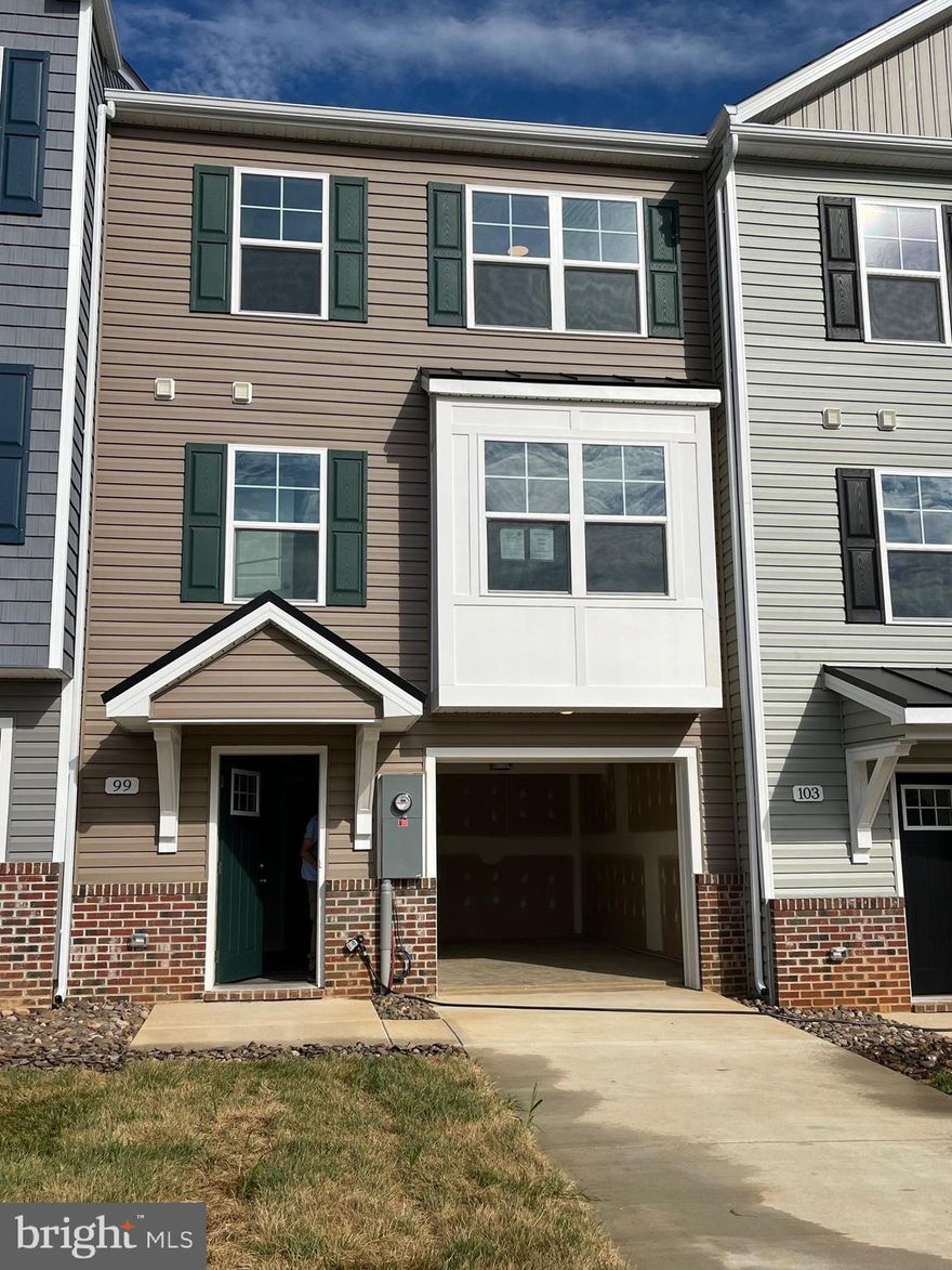 New Town Homes under construction in The Communities of Burwell featuring 1875 sqft of living space. Home has bump outs in main level family room, spacious open floor plan, 4 bedrooms/ 3.5 baths, Kitchen with granite countertops, separate island and island bar to family room, stainless steel appliances, and luxury vinyl plank flooring throughout the main level. The upper level primary bedroom has vaulted ceilings, walk in closet, and full bath with tile shower and glass door. The lower level offers 4th bedroom and full bath. Exterior brick on front, 1-car garage with auto opener, and concrete driveway included. **photos are similar construction**