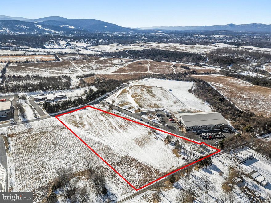 Beautiful Industrial Zoned 3 acre lot with 2 sheds  in the Happy Creek Technology Park. Happy Creek Technology Park is located in the Town limits, east of Front Royal on Virginia Route 606 aka Shenandoah Shores Road.  Happy Creek Technology Park is centrally located near I-66 and I-81 as well as the Virginia Inland Port.  The Park is less than one hour from the DC metropolitan area market.  Happy Creek Park is zoned industrial and is one of the technology zones in the Town of Front Royal.