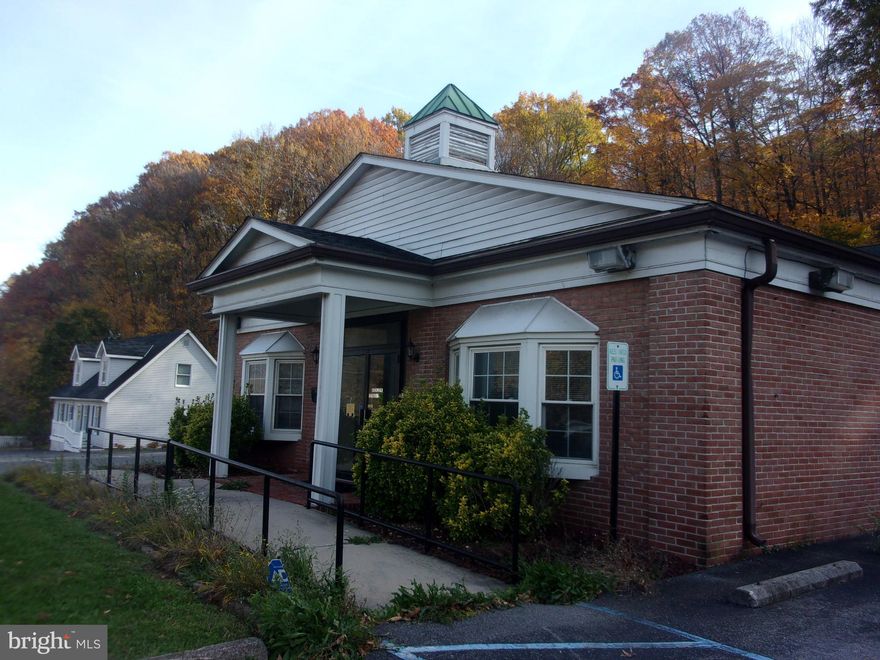 Brick commercial structure along National Highway in LaVale.  Ideal for retail, office or other commercial use.  Recently renovated interior.  On site macadam parking. Across from LaVale Plaza Shopping Center in highly visible location.