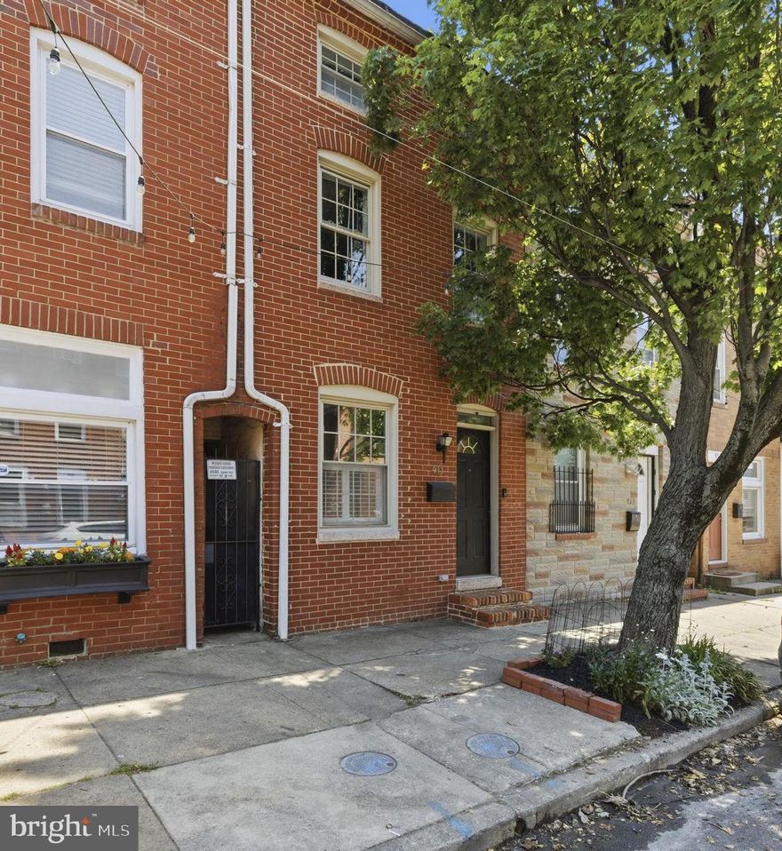 Nestled in the heart of Baltimore’s vibrant Upper Fells Point neighborhood, 411 S Wolfe St is a true gem—blending modern living with classic charm.

Step inside and you’re immediately greeted a wide open living space with wood floors and your classic Baltimore brick wall. As you move into the home you'll see extra space that's versatile and could function as another seating area or dining space. Past the open staircase you'll find a convenient half bath and side access to the backyard. In the rear you have updated kitchen featuring stainless steel appliances, granite countertops and space for additional seating. Off the kitchen you have a large room perfect for a big walk in pantry or mudroom that has access to the unfinished basement (great for storage!). Perhaps the best feature of this home is the massive back yard with tiered brick patios, multiple garden beds and a play area with a mature holly tree and rose bushes. 

On the second floor, you’ll find a 2 bedrooms with ample closet space, a full bathroom, and laundry. The third floor has an additional bedroom and full bathroom, perfect for a primary suite. With a third floor landing, accessing your private roof top deck is easy and convenient.

The location is unbeatable—just blocks from the waterfront, parks, and some of Baltimore’s best dining, coffee shops, and local boutiques. 

Don’t miss your chance to call 411 S Wolfe St home. Schedule your tour today and experience the best of Baltimore living.