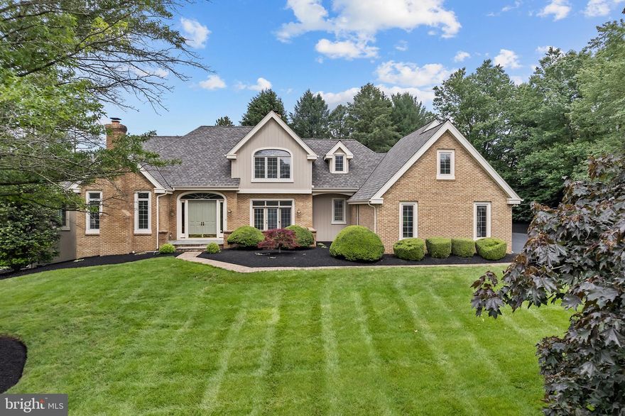 Welcome to this truly extraordinary 4-bedroom, 3.5-bath home nestled in the prestigious Merestone community of Landenberg. Thoughtfully designed and impeccably maintained, this residence offers the perfect blend of classic elegance, modern upgrades, and everyday comfort—all surrounded by a beautifully landscaped, private yard.

Step inside to a grand two-story foyer with a custom turned staircase, flanked by a formal living room with a cozy fireplace and an elegant dining room featuring French doors that open to a charming front patio. Hardwood floors flow seamlessly through much of the main level, creating warmth and cohesion throughout the home.

The heart of the home is the spectacular two-story family room, complete with a stunning stone fireplace, sitting area with built-ins, and French doors leading to the rear deck. This inviting space opens directly to the gourmet kitchen, where you’ll find granite countertops, ample cabinetry, a large center island, peninsula with seating, tile backsplash, stainless steel appliances, double wall ovens, plus a handy desk area. Just off the kitchen, the sunlit breakfast room leads to a 3-season sunroom and the outdoor oasis beyond—perfect for relaxing or entertaining in style.

The main-level owner’s suite is a true retreat, offering expansive space, walk-in closet, and a private bath with double vanity, oversized soaking tub and stall shower. 

Upstairs, you’ll find three additional bedrooms, including one with an en-suite bath and two that share a spacious hall bath. Two huge unfinished rooms on the upper level provide versatile options for storage or future finished spaces which could include a home office, hobby rooms, exercise rooms—the possibilities are endless.

Downstairs, a 3-car garage and meticulous upgrades throughout the home complete the picture. Enjoy peace of mind with a new architectural roof (2025), 10’ ceilings, high-end built-ins, and countless custom touches throughout. The location can’t be beat—close to shops, restaurants, parks, schools, athletic centers, and major commuting routes.

This is not just a home—it’s a statement. Every inch has been thoughtfully updated, beautifully maintained, and designed to impress.