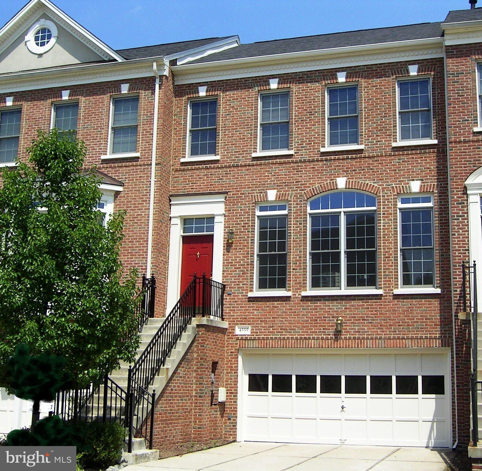 **Spectacular Brick Townhouse! Brand New Hardwoods-Main Floor, New W/W-2nd Floor/Rec.Rm, Cathedral ceilings-2nd floor, Master Bedroom w/ Bath Suite. Gourmet Kitchen w/Center Island, Cherry Cabinets, Brand New GE Wall Oven/Microwave. Crown Moldings, Spacious Living Rm, Fireplace in Family Rm & Rec Rm. Transom Windows. Wood deck & brick patio area. 2 Car Garage, Largest Model. Many Updates!