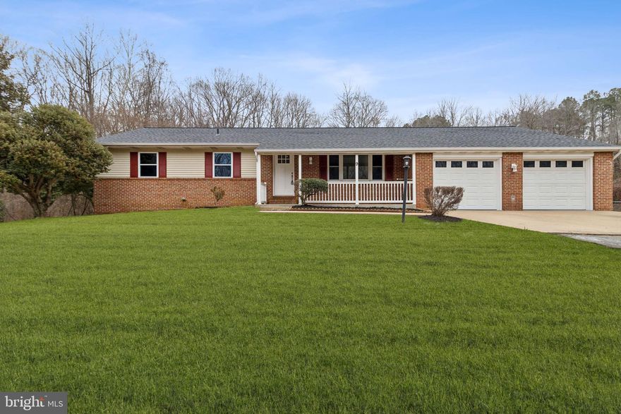 Welcome to this beautifully renovated rambler set on a stunning 3 acre flat lot in Stafford, VA, offering the perfect blend of modern upgrades, space, and convenience. This home has undergone extensive renovations, including a brand-new roof, new windows and doors, a newly paved asphalt driveway, new hot water heater, updated flooring throughout, fresh designer paint, a fully remodeled kitchen, upgraded bathrooms, and new garage equipment. As you step inside, you’re welcomed by stylish new luxury vinyl flooring that flows seamlessly throughout the home, leading to a thoughtfully designed layout featuring a formal living room, a spacious family room, an eat-in kitchen, mudroom, laundry area, three generously sized bedrooms, and two fully updated bathrooms. The kitchen is a true highlight with custom cabinetry, elegant backsplash, quartz countertops, stainless steel appliances, and an oversized island ideal for entertaining or everyday living. Both bathrooms have been tastefully renovated with high-quality porcelain tile, custom vanities, and beautifully finished shower spaces. The oversized four-car garage offers exceptional storage and includes a separate bonus room perfect for a gym, office, or hobby space. With endless possibilities on this expansive, level acreage and a prime location close to shopping, major highways, VRE commuter access, and the Stafford waterfront area, this exceptional property presents a rare opportunity that truly must be seen to be appreciated.