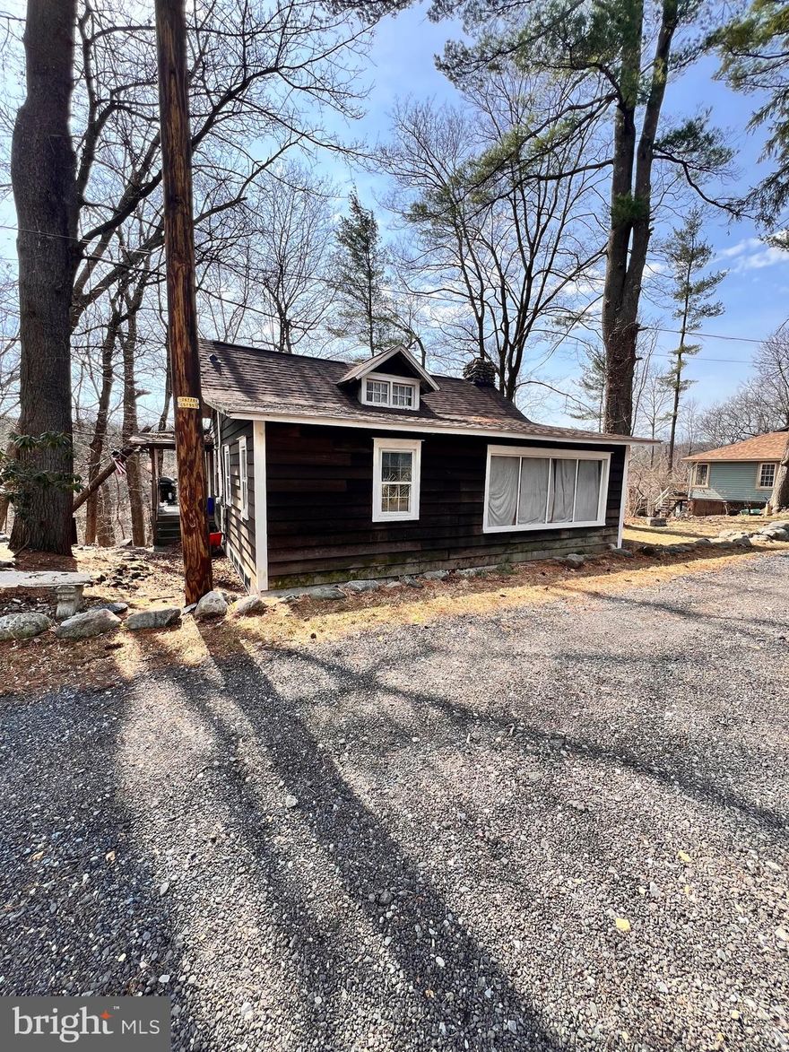 Come Bring this Cozy Cabin back to life!
 Cabin  with additional lot Overlooking  the mountain with view of Lake Watawah just  short walk to Sailors Lake & The Lakeside Tavern. Short Drive to All Hamlin has to offer and close to all Poconos Attractions ! 
Make an appointment today ! 
**HOME NEEDS UPDATING LARGE UNFINISHED CRAWL SPACE WALK OUT HUGE  WITH SEPARATE  ENTRANCE ** Double lot two separate Pins