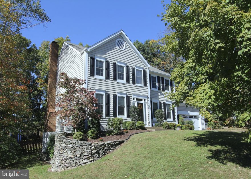 MAJOR PRICE DROP! Beautiful colonial in Edinburgh - 3 finished levels, huge fenced back yard, 572 sq ft garage and many updates including Pella Thermastar Low-E windows, sprinkler system, remodeled kitchen, Trane HVAC and more.  Finished lower level offers great open space, media area, full bathroom, side entrance and backs to tranquil farmland. HOA fee is optional.