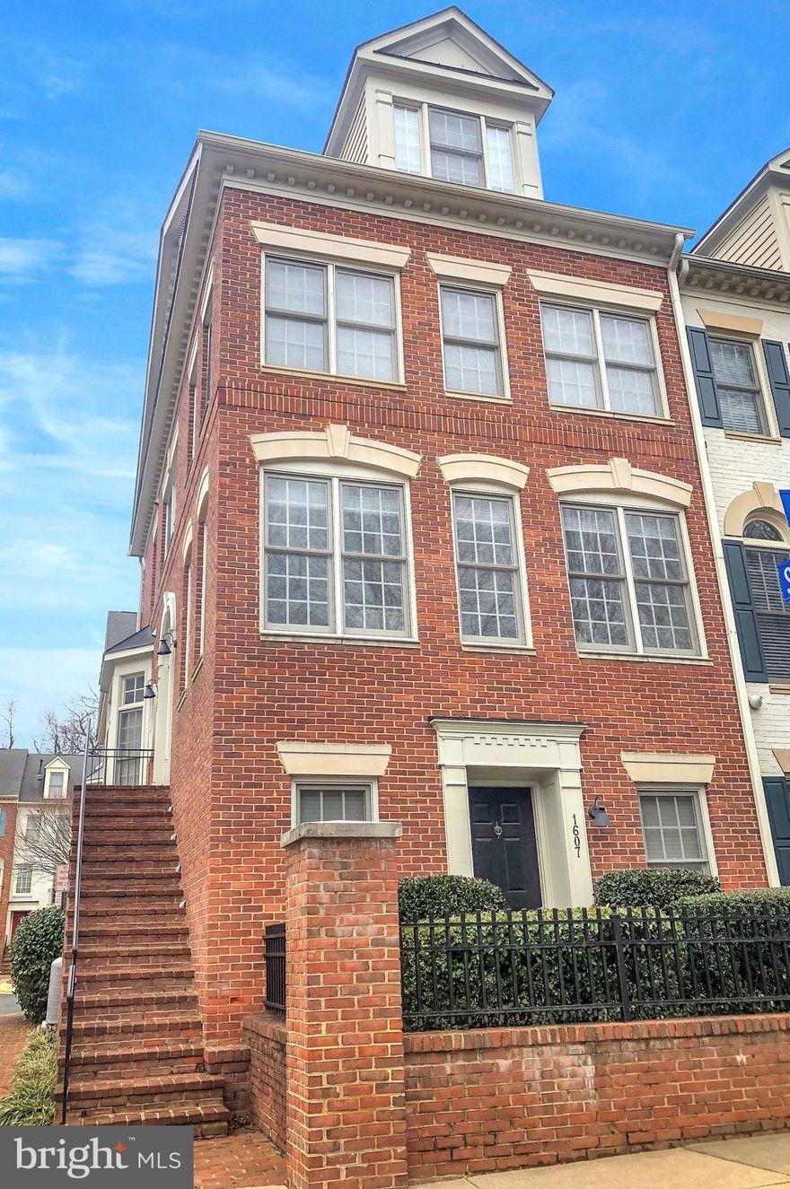 This move-in townhouse is ready to welcome you home.  The main level features hardwood floors, spacious living and dining room area and family room with gas fireplace and access to the rear balcony.  The gourmet kitchen includes granite counter top and island with gas cooktop with down draft. Refrigerator and dishwasher. Kitchen-Aid stainless steel double convention ovens and convention microwave installed in 2018.  Lots of cabinet storage, pantry and eat-in area in the kitchen also.  Upper level 1 is the primary suite that features a large bedroom with sitting area or office. Primary bath has dual vanities, separate soaking tub, shower and two walk-in closets.  Upper level 2 has two additional bedrooms and full bath.  Both levels have new carpet. The lower level features rec room, laundry room with cabinets for storage, half bath and 2 car garage with wifi enable openers (2016). Hot water heater replaced May 2020.  Washer/Dryer (2017) Convenient location close to Harris Teeter, Safeway, Tyson's Corner, 66, 495 and more.  Just minutes to McLean Metro.