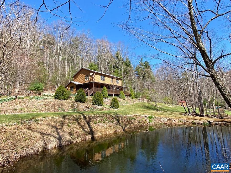This checks so many boxes - log cabin with wrap around porches, pond, creek, and mountain views! Truly an amazing place to love where you live and have unlimited outdoor recreation. Imagine waking up to this peaceful setting within a few miles of George Washington National Forest, Appalachian Trail, Blue Ridge Parkway, Tye River, Crabtree Falls, Montebello Fish Hatchery; Also near Wintergreen Resort (skiing, golf, and more) AND wine and brew trails AND many orchards. Wonderful as full time residence, vacation getaway, or investment rental; move-in ready and already has fiber optic internet for streaming and connectivity. Cabin has been loved and well maintained to include full exterior painting 2023, Trane HVAC 2016, leaf gutter guards 2022, Generac generator 2021, most appliances and water heater in past 5 years, and recent construction of bridge over creek and fenced garden and multiple sitting/relaxation areas. Extras: solid 2 x 6 construction with log siding and metal roof, high ceiling and open flow, wood floors, Jotul propane fireplace, handicap accessible features (ramp, doors, shower, 1st floor bedrooms), all bedrooms have access to own full bath, storage shed, ample parking, privacy, and no HOA or restrictions!,Formica Counter,Maple Cabinets,Fireplace in Great Room