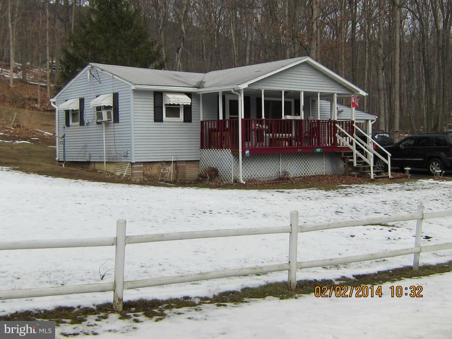 Looking for a great investment.   Selling additional lot to right side of this home for privacy and possible  location for you to drill a well. Former owner was sharing well water but it doesn't convey