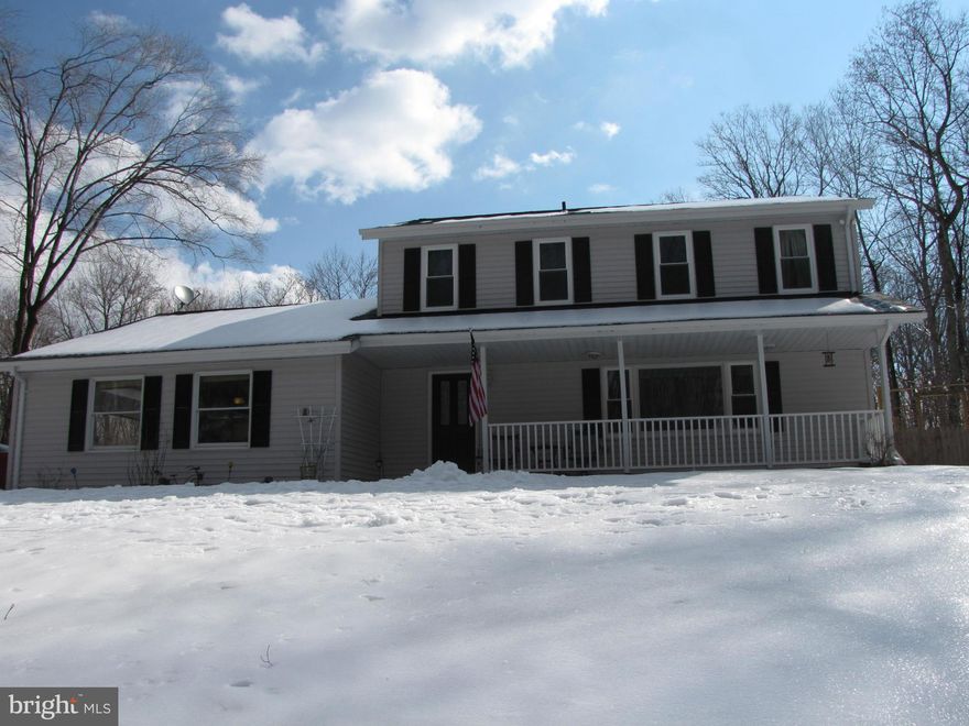 Enjoy peace and tranquility in this lovely 5 acre retreat. New Gourmet Kitchen with Granite and double oven. Fully finished basement w/ rec room with walkout. Living room with Pool table!  Extra den/bedroom in basement. Large Deck off of family room. 2 car garage and detached carport.   In-ground pool, fire-pit and Pavilion. Bi-weekly Pool Maintenance taken care of by owner. Community pond access.