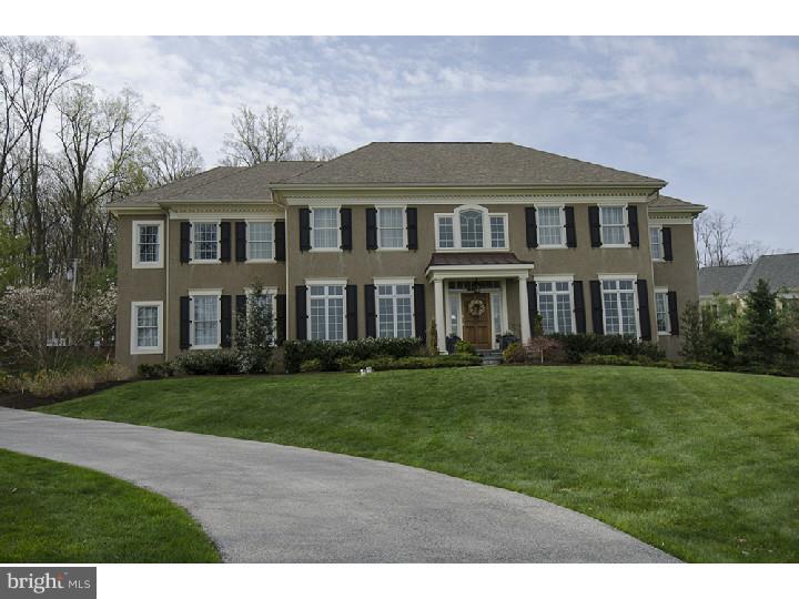 Fabulous estate home in the desirable community of Whitegate. This meticulously appointed center hall colonial features 5 spacious bedrooms, 3 full baths and a powder room situated on a lushly landscaped .79 acres in Wayne. Enter the grand foyer flanked by an elegant living room and formal dining room with adjacent wet bar area leading to an open gourmet kitchen featuring state of the art appliances, 42" cabinetry, large granite island with counter seating, desk area, and a separate breakfast area that walks out to a charming private patio oasis complete with koi pond. Bright and light family/great room features two story palladium windows and a stately fireplace. Separate sunroom, office with custom built in shelving and mud room with custom beadboard cubbies and back staircase complete the first floor. Upstairs find a gracious master bedroom suite with large walk in closet finished with cherry cabinetry, full bath including soaking tub and double sinks. Four more spacious bedrooms (1 with full bathroom attached), a hall bath with double sinks, and second floor laundry. Professionally decorated and ready to move right in- welcome home!