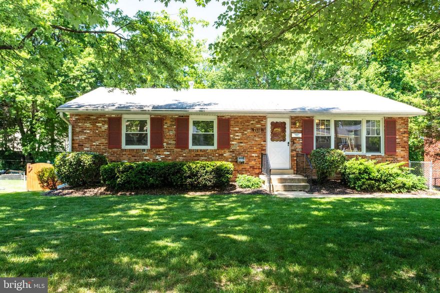 Welcome to 7111 Layton Drive. This charming brick rambler features a large in-ground swimming pool and is located walking distance to Springfield Town Center!
