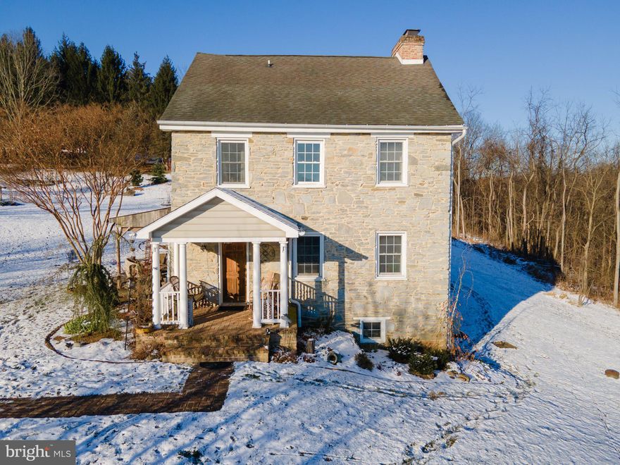Discover a rare blend of timeless charm and modern luxury in this stunning 1834 farmhouse, perfectly situated on 20 pristine acres in the heart of the Harper’s Ferry area. The original stone home, built in 1834, has been lovingly preserved and thoughtfully expanded with a seamless, high-quality addition constructed in the early 2000s, creating a harmonious balance of historic character and contemporary comfort.

Step inside to find original wide-plank hardwood floors with rich patina, massive exposed stone walls, four  fireplaces with two  elegant period mantels, and the unique feature of original kitchen cabinets repurposed into the dining room—a true nod to its storied past. The conditioned stone basement, with its cool natural charm, offers endless potential as a private speakeasy, wine cellar, cigar lounge, or creative retreat.

The modern addition provides spacious, light-filled living areas, updated systems, and all the conveniences of today while respecting the home’s historic integrity.

Outside, the property is a true equestrian and outdoor enthusiast’s dream. A beautiful new barn features six generous stalls, a wash bay, ample storage, and a full riding arena, all surrounded by well-maintained fencing. Rolling pastures, mature trees, and breathtaking mountain views stretch for miles, offering unparalleled privacy and serenity.

The grounds are meticulously landscaped and maintained, with mature gardens, stone walls, and peaceful walking paths. Yet this tranquil retreat is conveniently located just minutes from Harper’s Ferry’s historic sites, charming shops, dining, and major commuter routes.

This is not just a house—it’s a legacy property that combines 19th-century craftsmanship, modern amenities, and the perfect setting for a peaceful, active lifestyle. Rarely does a home of this caliber and history come to market. Don’t miss the opportunity to own a piece of history with all the comforts of today.  

Please No Drive By's.  Property is not visible from the road. Surveillance/Recording Equipment in Use.