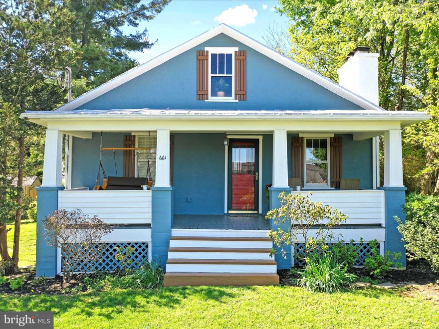 Charming Cottage in the Heart of Harpers Ferry!

Welcome to 661 E Ridge St, a beautifully maintained and thoughtfully updated 1930s craftsman style cottage full of character and warmth. Nestled on a peaceful, sunny lot, this three-bedroom, two-bathroom home offers a perfect blend of vintage charm and modern comfort.

Step inside to discover hardwood floors, gorgeous wood trim, and a cozy stone fireplace that anchors the living room — perfect for chilly evenings. The bright and airy sunroom provides an inviting space for morning coffee or afternoon reading. The kitchen features rich wood cabinetry, a stylish checkered floor, and stainless steel appliances, making it as functional as it is charming.

Upstairs, you'll find a delightful loft-style space with warm wood ceilings and floors, perfect for a home office, guest quarters, or a creative retreat. The bathrooms are tastefully updated, offering a blend of modern fixtures and classic style.

Outside, enjoy the garden beds and beautiful trees, the fenced back yard, a private stone patio and wisteria trellis— ideal for entertaining or relaxing in your own outdoor oasis. The basement provides additional storage or workspace, and the extra off-street driveway for parking is a bonus.

Located just minutes from restaurants, shops, the historic town center, the C&O Canal, the Appalachian Trail, and the Shenandoah and Potomac Rivers. You will experience spectacular night skies, majestic rainbows, and a plethora of birds. This home is a dream for outdoor enthusiasts and history lovers alike.