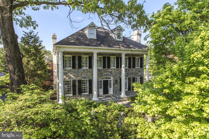 Magnificent custom-built stone & brick stately colonial sited on cul-de-sac off Lorcom Lane * Rich architectural detailing & luxury amenities throughout * Elevator * Garage w/ a lift to accommodate 4 cars * High ceilings on 3 levels * Opulent millwork * Wine cellar * Spectacular master suite w/ sitting room, gas fireplace & heated bathroom floors * Impressive theater room * Full house generator