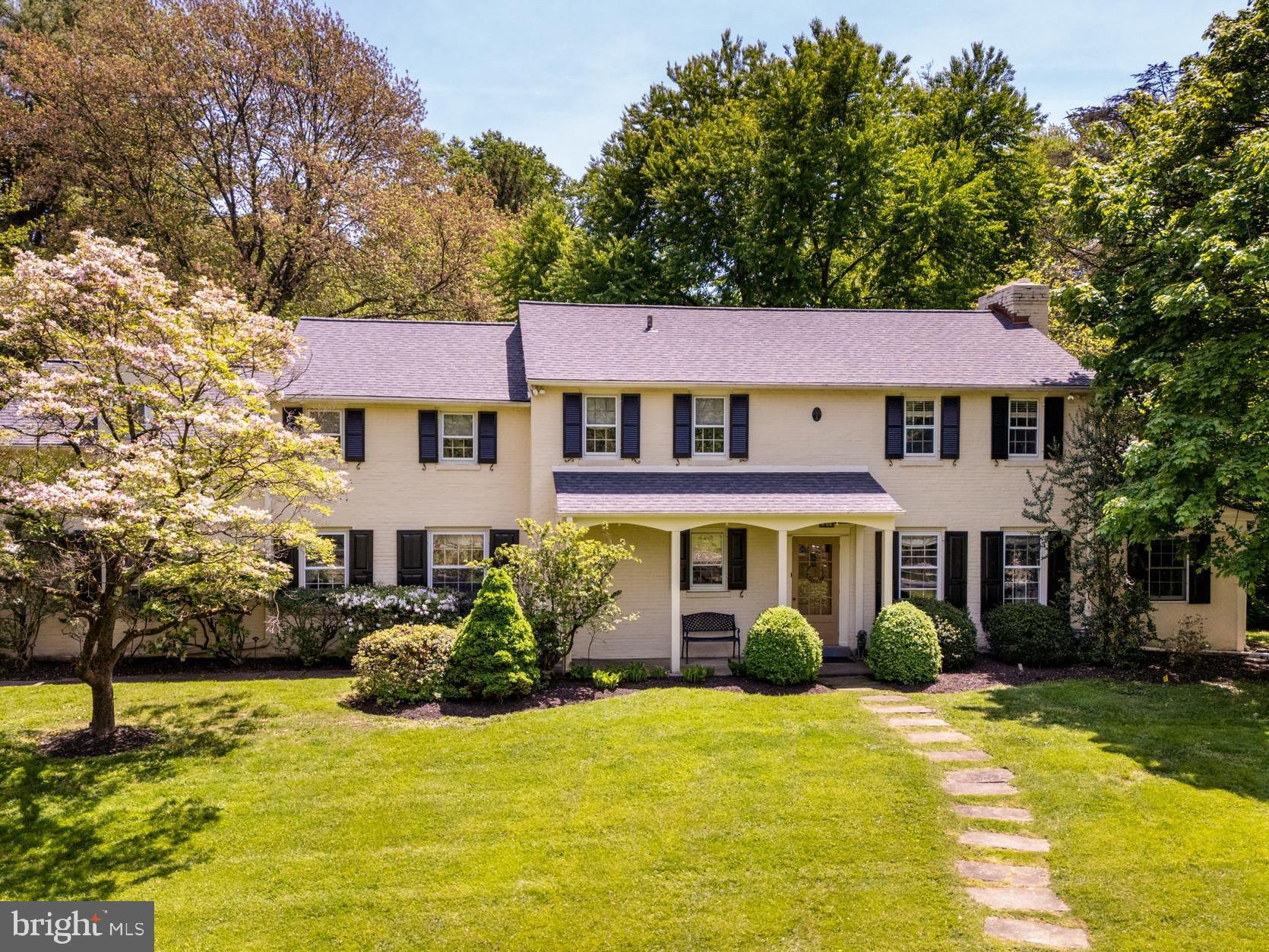 Welcome to this updated 2 story Colonial on a gorgeous large lot overlooking Philadelphia Country Club! 1008 Stony Lane is located in this highly desirable Gladwyne neighborhood on almost an acre of property with mature plantings. Enter the home into a beautiful foyer which seamlessly flows into the formal Dining Room with glass doors and views to the flagstone patio and backyard. The Living Room boasts a wood burning fireplace, hardwood floors and opens to a large sunny study. At the back of the house and off the large patio, there is the eat-in kitchen with granite countertops, stainless steel appliances, a center island, desk & bookshelf, walk-in pantry, corner breakfast nook with built-in bench seating, powder room and cabinets with lots of storage. The kitchen also opens to a light filled family room with cathedral ceiling, skylights, gas fireplace, built-in cabinets and access to the mud room and attached two-car garage.
The 2nd floor features a Master Suite with three closets and an en-suite bath with granite countertops, double sinks, a relaxing whirlpool soaking tub and a tiled walk-in shower. In addition, there are 2 large bedrooms with closets, a full hall bath, large laundry/linen closet and a 4th bedroom with en-suite bath. The finished basement is ready for family fun with lots of storage spaces. Location, location, location: pastoral views, privacy, award-winning Lower Merion School District, easy access to 76, 476 and proximity to the charming towns of Conshohocken, Gladwyne and Bryn Mawr with many choice restaurants and shops.