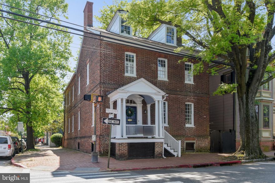 Tour This Magnificent House online by CLICKING ON THE MOVIE REEL ICON LOCATED ABOVE THE PHOTO or PASTING THE FOLLOWING LINK:https://mls.TruPlace.com/property/237/76123/    Call Mary Beth Today for your personal tour.......Now Priced at $1,350,000! A Stunning 5 BR,  3 Full BA, 2 1/2 BA, 3684 Finished SF Home in The Heart of Historic Annapolis with 2 Car Detached Garage and Driveway! Built in the late 1700's this Home Offers  Spacious Rooms, Abundant Windows, Beautiful Woodwork, 11+Ft Ceilings, Gorgeous Hardwood Flooring and Renovated Large Kitchen that will Be Enjoyed Every Single Day.  Relax In Your New Owners Suite Complete with Master Bathroom with Oversized Shower, Walk in Custom Closet with Washer and Dryer Too.  Guests Will Find Comfort in the Four Additional Upper Level Bedrooms and Two Fully Renovated Additional Full Bathrooms.  Seller Has Painted Interior of the Home and Has Replaced HVAC System While Upgrading Electrical and Plumbing Too.  Welcome Home to 179 Duke of Gloucester Street!